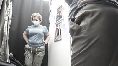 I'm in the fitting room trying on pants.