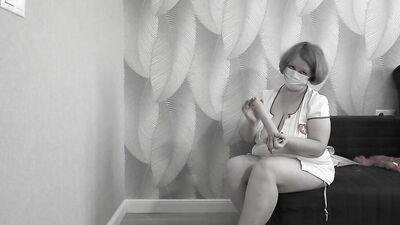 Mature BBW MILF tries on a nurse uniform.