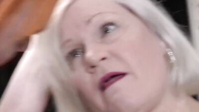 Kinky gran rides strapon toy