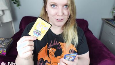 Blonde gamer joins behind the scenes of a Pokemon Card Unboxing with nerdy cosplay girl Julie Bliss
