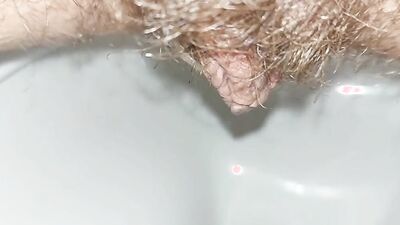 the longest trip to the bathroom, a very long piss, a hairy pussy peeing