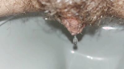 the longest trip to the bathroom, a very long piss, a hairy pussy peeing
