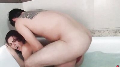 Dancing funk in red panties in hot tub