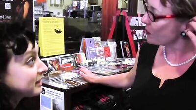 MILF in Glasses Plays with her Stepdaughter's Pussy in the Shop