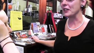 MILF in Glasses Plays with her Stepdaughter's Pussy in the Shop
