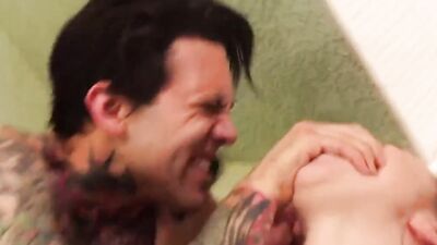 Bailey Brooke is being fucked by a tattooed man under the shower