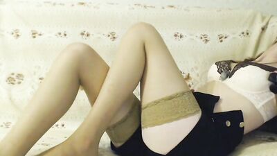 Smoking blonde stepmom plays with a toy