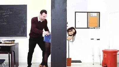 Hot redhead schoolgirl fucks her teacher in a classroom