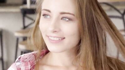 Pretty girl flirts with the camera while getting cock from behind