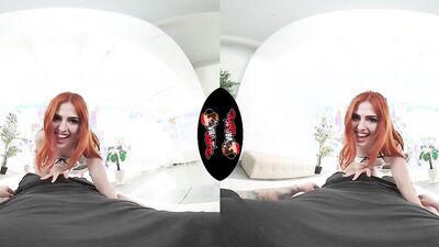 gorgeous redheaded doll is riding a cock in this hot VR