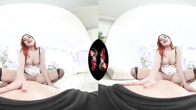 gorgeous redheaded doll is riding a cock in this hot VR