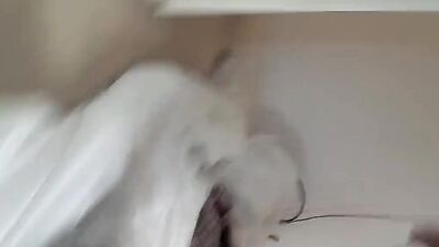 Chubby masked girl is riding a dildo in front of the camera
