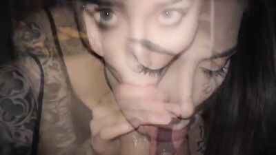 Amateur girl seductively stares at the camera while sucking a dick