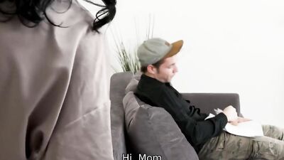 Brunette MILF grabs stepson by the cock and sucks it
