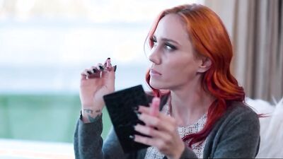 Redhead and blonde are making out and licking one another