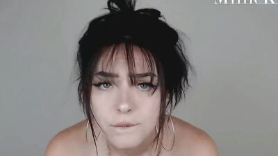 Pretty girl makes lovely facial expressions while playing with dick