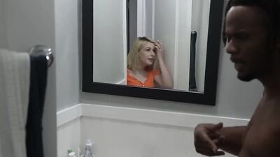 Petite blonde sucks a black cock and gets shagged deeply