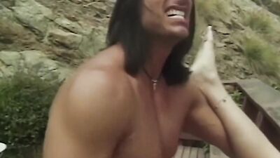 Brunette sucks a dick and gets fucked on the balcony