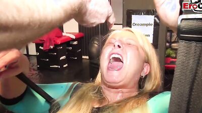 Slutty MILF is pissed on at this kinky gold shower party