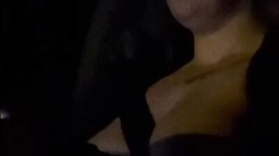 MILF takes her big natural tits out while driving a car