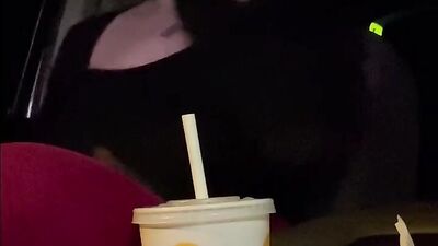 MILF takes her big natural tits out while driving a car