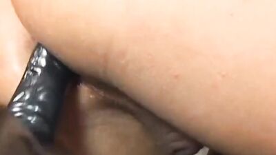 Sissy is being strap-on fucked by two domiant ladies