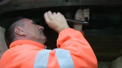 MILF blows car mechanic and gets fucked on a dirty floor