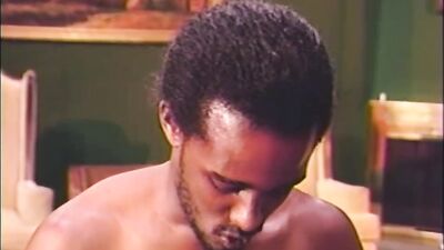 Horny black couple is having sex in this vintage porn video