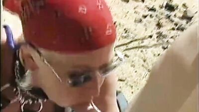 Gorgeous blonde babe and horny lad are fucking on the beach