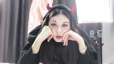 Cosplay girl sucks some dick and rides it on webcam show