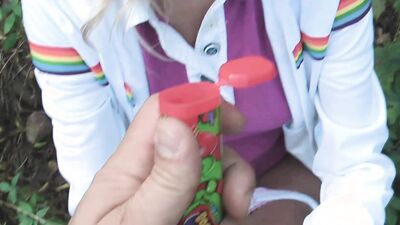 GORGEOUS YOUNG BLONDE BLOWS BUBBLE GUM AND SWALLOWS CUM FROM STRANGER IN THE PARK