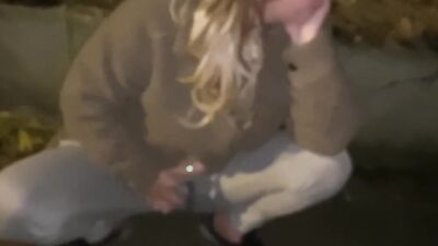Street woman is offered a drink to take a cum shot