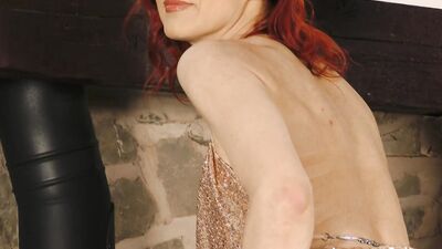 Redheaded MILF Puts Her Book Down To Play With Her Shaved Pussy