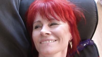 Old redheaded minx stretches her white fanny with a dildo before fulfilling her BBC fantasy