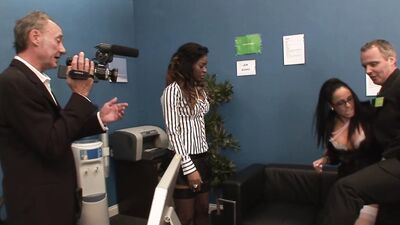 The black secretary is fond of interracial group sex with her bosses at the office