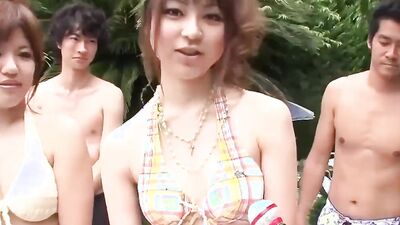 Asian group sex starts with a pool party
